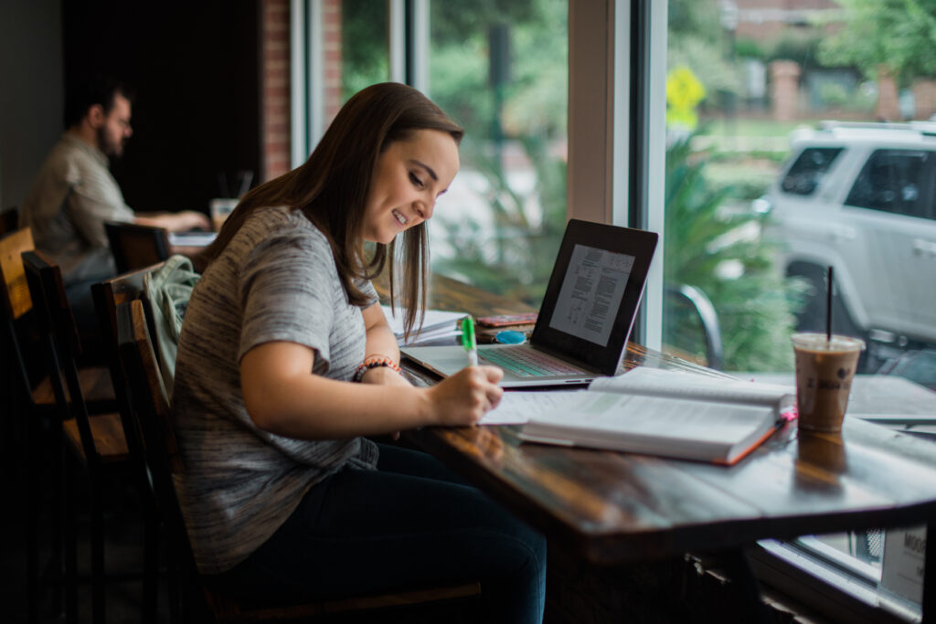 A Mercer student studying at Z Beans.