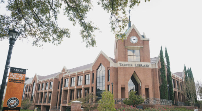 5 places to study for finals on Mercer’s Macon campus Tarver Library with clock tower, brick facade, and surrounding trees.