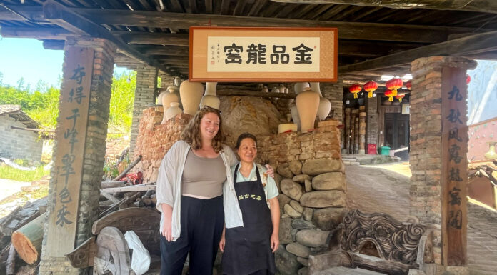 Art professor draws inspiration from ancient China during residency Mary O'Malley and another woman stand in a dragon kiln.