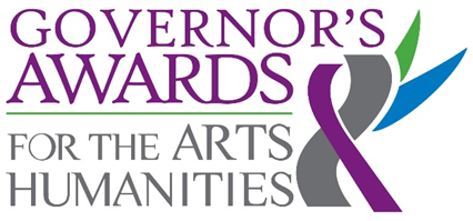 Logo for the Governors Awards for the Arts & Humanities, featuring purple, gray, and green text with a stylized ampersand.