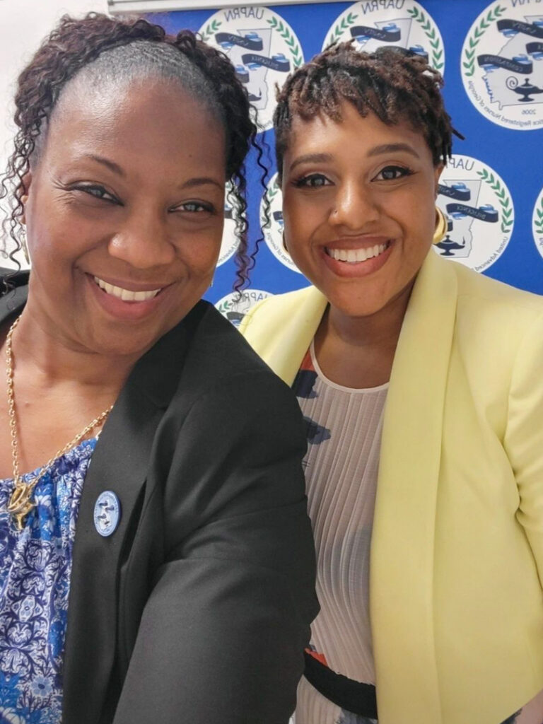 Nancy Hurlock and Patrice Little taking a selfie.