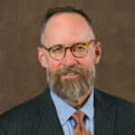 Dr. Greg DeLoach