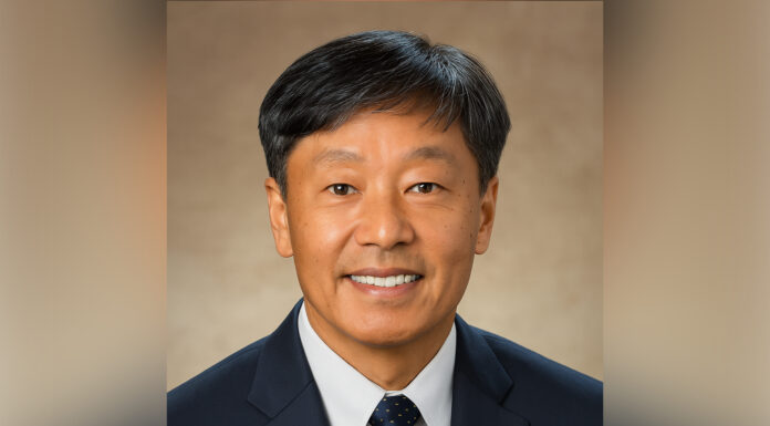 Dr. Chang Chung appointed chair of biomedical sciences at School of Medicine Dr. Chang Y. Chung smiles at the camera against a neutral brown background.