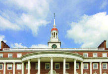 Mercer Law’s first-time bar passage rate is among highest in Georgia Front view of Mercer Law School on a green lawn.
