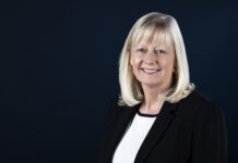 Dr. Vicki Britt appointed dean of School of Engineering Woman with shoulder-length blonde hair in a black blazer and white blouse, smiling against a dark blue background.