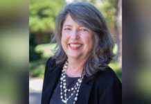 Center for the Study of Narrative to Host Lecture by Dr. Denise Massey Middle-aged woman with long gray hair, wearing a black blazer and pearl necklace, smiling outdoors.