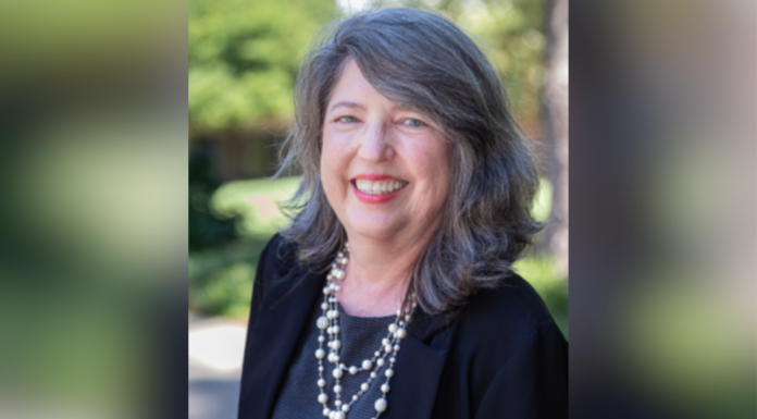 Center for the Study of Narrative to host lecture by Dr. Denise Massey Middle-aged woman with long gray hair, wearing a black blazer and pearl necklace, smiling outdoors.