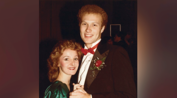 Mercer co-op an integral part of faculty members’ love story A young couple in formal attire pose together while dancing, with the man wearing a tuxedo and the woman in a green dress.