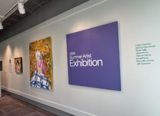 McEachern Art Center opens summer exhibition, relaunches membership program A gallery wall displays art and a large purple sign reading 2026 Summer Artist Exhibition with a list of artists names.