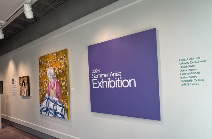 A gallery wall displays art and a large purple sign reading 2026 Summer Artist Exhibition with a list of artists names.