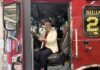 Honeywell engineer learned communication skills, curiosity from Mercer Katie Davis sits in the driver’s seat of a red fire truck inside a fire station.