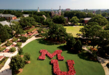 Mercer welcomes over 1,100 new students for Opening Days and Bear Beginnings 2026 Students form a large MU on Cruz Plaza, with historic university buildings and trees in the background on a sunny day.