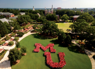 Mercer welcomes over 1,100 new students for Opening Days and Bear Beginnings 2026 Students form a large MU on Cruz Plaza, with historic university buildings and trees in the background on a sunny day.