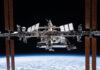 Engineering alumnus helping lead the way in space exploration The International Space Station orbits above Earth with solar panels extended against the blackness of space.