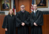 Georgia Court of Appeals holds oral arguments at Mercer School of Law Three judges in black robes stand side by side in a courtroom.