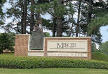 Faculty and Staff Notables | October 2026 Mercer University Campus West entrance sign with brick base, greenery, and trees in the background.