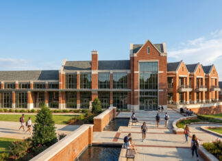Mercer University reveals first look at new student life center Artist rendering of a large brick academic building with tall windows and landscaped paths on a sunny day.