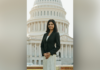 Shafa Gilani Selected as 2026–27 Newman Civic Fellow A woman in business attire stands in front of the U.S. Capitol building, smiling at the camera.