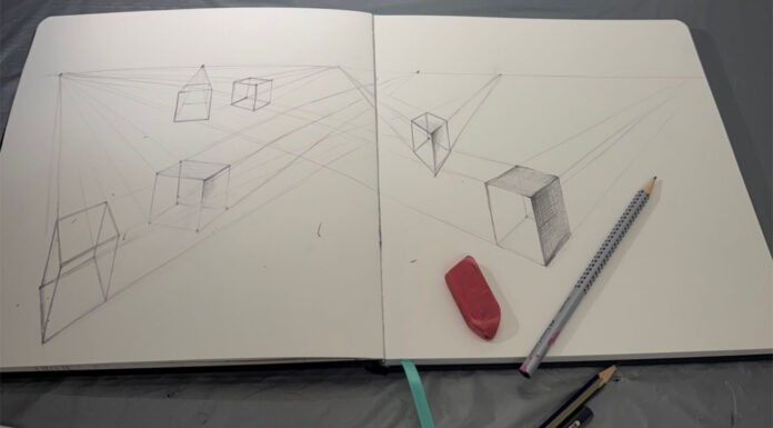 The perspective we choose makes all the difference | Craig McMahan, Ph.D. Open sketchbook with perspective cube drawings, an eraser, and two pencils on a gray surface.