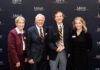 Ed Grimsley, M.D., named 2026 Sandra Dunagan Deal Rural Service Fellow Mercer School of Medicine Dean Jean Sumner, M.D.; former Gov. Nathan Deal; Ed Grimsley, M.D.; and Mercer Vice President of External Relations Ember Bentley standing in front of a Mercer University School of Medicine backdrop.