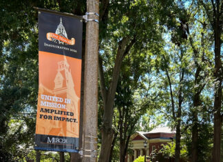 Countdown to 19 kicks off with Family Weekend A banner on a pole reading One Mercer Inauguration 2026: United in Mission. Amplified for Impact.