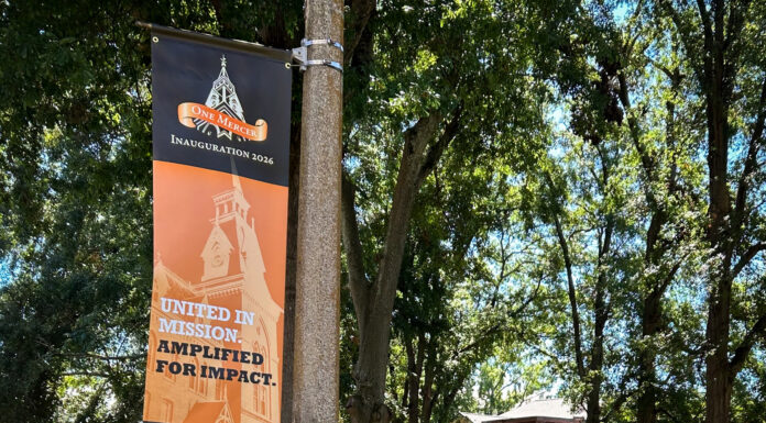 Countdown to 19 kicks off with Family Weekend A banner on a pole reading One Mercer Inauguration 2026: United in Mission. Amplified for Impact.