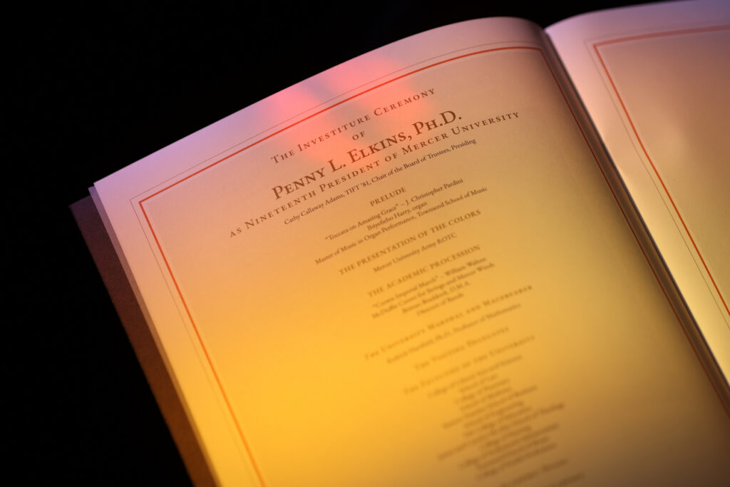 Printed program for the investiture ceremony of Mercer University President Penny L. Elkins, Ph.D.